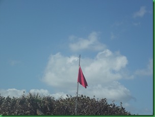 Red Flag means High Hazard but not to surfers