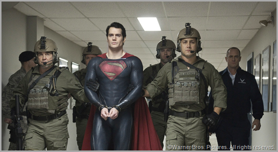 Superman (Henry Cavill) turns himself in to save the human race. CLICK to visit the official MAN OF STEEL site.
