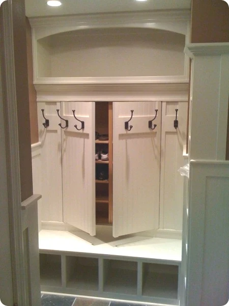 hidden storage for shoes in mud room