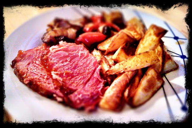 Roast gammon with potato wedges and griddled vegetables