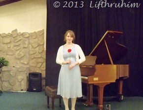 Boobear poses with flower after the recital.