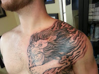 Black Men Lion Chest Tattoo