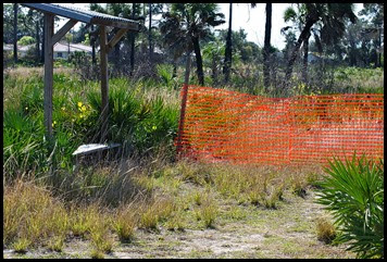 03e0 - Eagle Walk - Bench and Orange mesh barrier