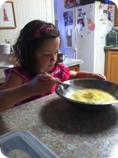 Helping Nana make breakfast