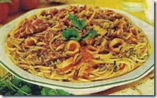 Spaghetti con sugo di calamari e pan fritto