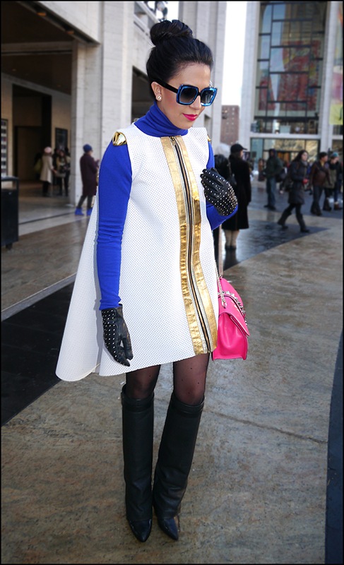 23 w ultra modern dress with gold trim blue turtle neck knee high boots black with silver studded gloves bright pink purse ol
