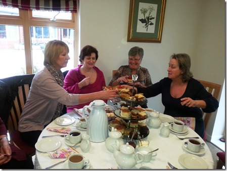 St Luke's (Cheshire) Hospice volunteers get in the spirit ahead of the Great Hospice Bake Off 2013 