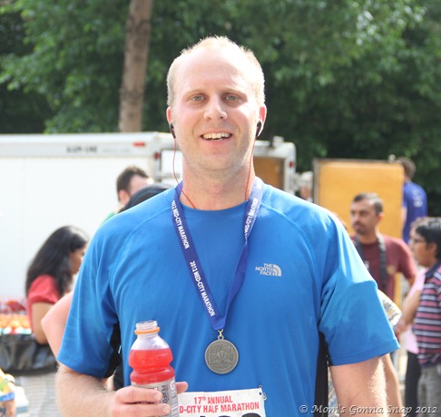 He looks pretty good for just running 13.1 miles in extremely hot weather!