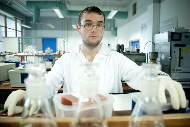 6/10/2011 -- ADV PHOTOJOURNALISM -- Benjamin Smith (22) from Drogheda, a 4th year Analytical Science student at the Dublin City University. Before putting the flasks in order, he would put the protective glasses on. Photograph: Aleksander Szojda / DCU