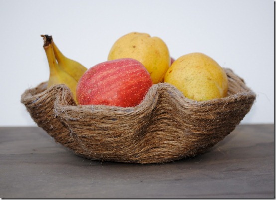 Fruit bowl made from a melted vinyl record wrapped in jute