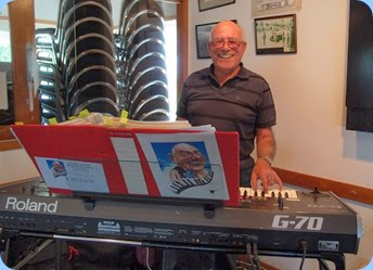 Treasurer, Laurie Conder playing his Roland G-70 keyboard. Photo courtesy of Dennis Lyons
