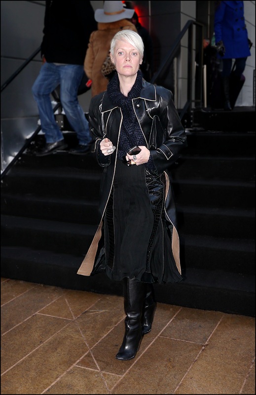 kate lanphear long black leather coat with piping long black skirt knit t nech black boots ol