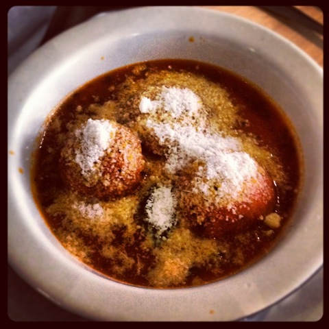 Alghero's deep-fried grana padano balls with tomato sauce
