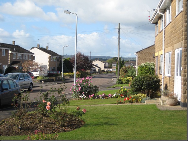 I think "The Green" was on the right. My grandparents prefab would have been at the end of this road on the left.  Yours too Jean!