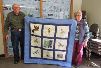 Mom and Dad and the quilt from the cousins