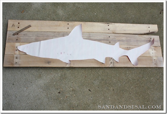 Draw shark onto pallet wood 