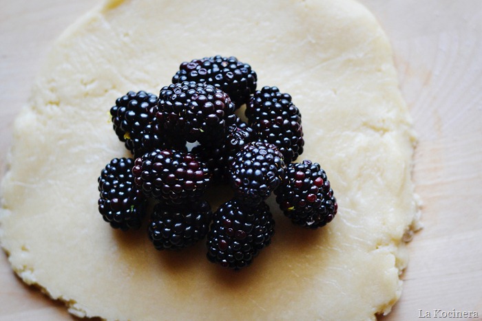blackberries on dough