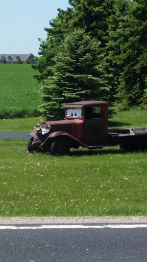 Old Tow Truck With Cartoon Eyes