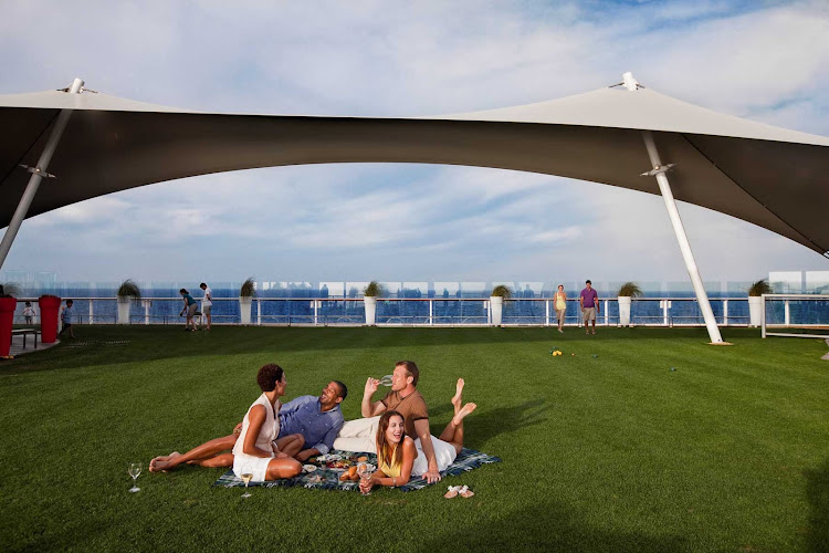 The expansive lawn area of Celebrity Solstice is the ideal spot for a picnic with friends.