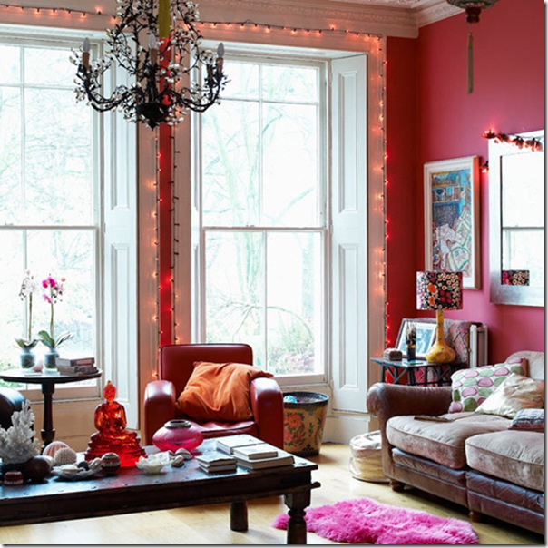 Pink living room floor to ceiling sash window windows ethnic antique coffee Chinese lanterns fairy lights sofa wood flooring rugs armchairs  table real home L etc 03/2009 not used