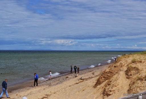 People looking for agates on the beach
