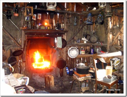 Inside the bearded miners shack with earth floor. Basic and simple. There is always a billy boiling on the hob.