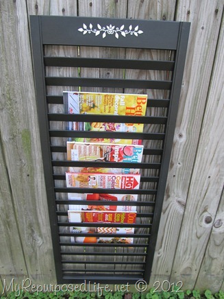 magazine rack repurposed from bi-fold door