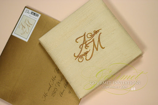 These wedding invitations were made a story book with a silk cover and