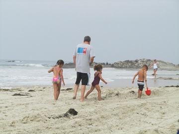 tripp taking kids on beach adventure (1 of 1)