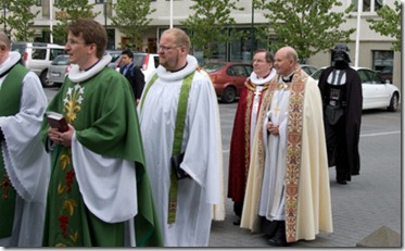 Darth Vader in procession with Anglican priests