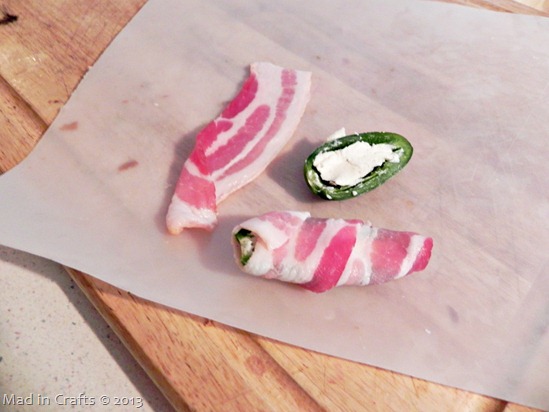 wrap the stuffed jalapenos in bacon