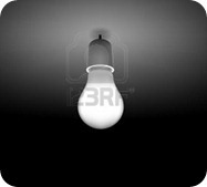 6306182-classic-light-bulb-on-the-da[1]