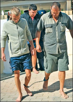AFRIKANERS IN LAW COURTS CLAPPED IN CHAIN BAREFOOT HUMILATED