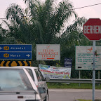 After driving for another 40 minuts, we finally we a road sign that says “Felda Residence Tekam”...