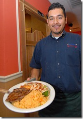 La Cascada owner Ignacio Patino serves up a hearty Mexican meal.
