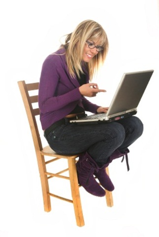 Young casual girl with a laptop