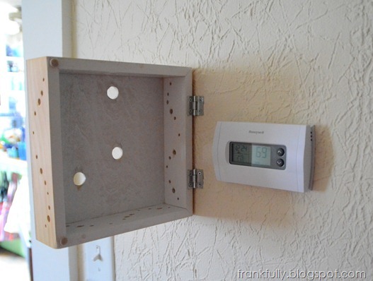 the inside of the cover, hinged to access the thermostat cover the inside of the cover, hinged to access the thermostat cover