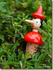 Pinocchio on the head of a cork