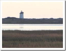 11.2011 sun setting lighthouse west end provincetown