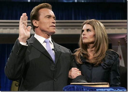 File photo of California Governor Arnold Schwarzenegger taking oath of office in Sacramento...California Governor Arnold Schwarzenegger is joined by his wife Maria Shriver while being sworn into office for a second term by Supreme Court Chief Justice Ronald George during his inauguration ceremony at the Memorial Auditorium in Sacramento, California in this January 5, 2007 file photo. The former California first lady has moved out after 25 years of marriage, reported Los Angeles Times. The couple confirmed their separation in a joint statement released on May 9, 2011 after questions were raised by The Times.  REUTERS/Rich Pedroncelli/Pool/Files  (UNITED STATES - Tags: POLITICS ENTERTAINMENT)