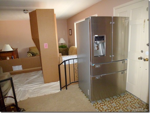 Aug 7, 2013: Appliances have arrived! Refrigerator in the foyer