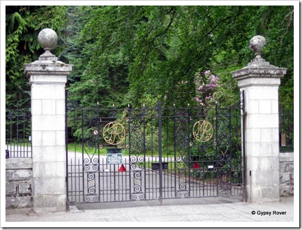 Entrance gates inscribed with Queen Mary and King George. Balmoral Castle.