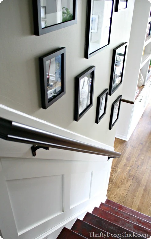 gallery on stair wall