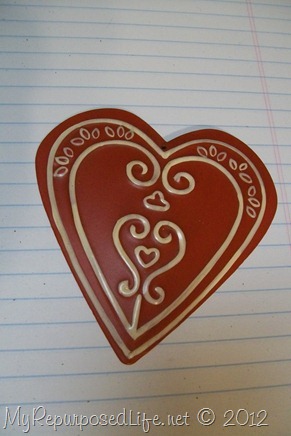 red metal heart with flourishes