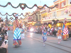 Disney trip movers shakers walking on stilts