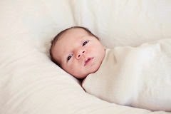 [sweet-newborn-baby-swaddled-natural-blanket-eyes-open-30026265%255B2%255D.jpg]