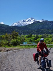 Riding towards Chile with Parque Nacional Los Alerces in the background.