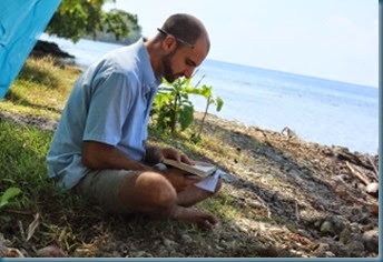 Aaron studing on beach 7-13