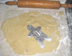 sugar cookie rolled out dough w gingbread cutter