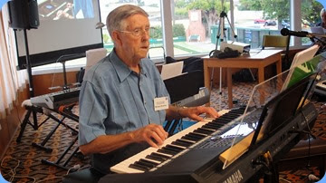 Michael Bramley playing his Yamaha PSR-S950 keyboard. Photo courtesy of Dennis Lyons